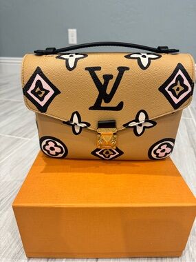 Louis Vuitton Wild at Heart Pochette Métis